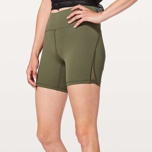 Dark green lulu train times shorts